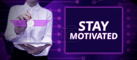Photo for Text sign showing Stay Motivated, Business showcase Reward yourself every time you reach a goal with knowledge - Royalty Free Image