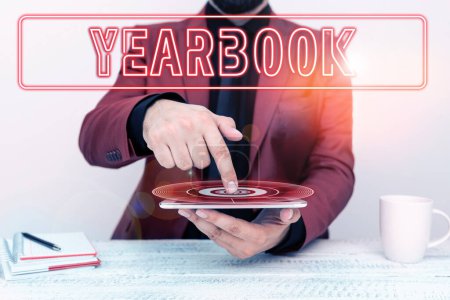 Photo for Handwriting text Yearbook, Conceptual photo publication compiled by graduating class as a record of the years activities - Royalty Free Image