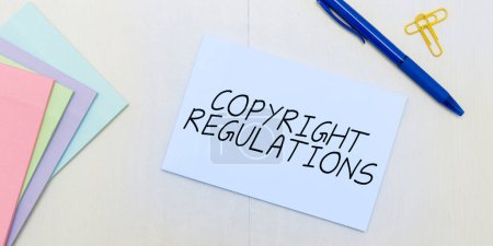 Foto de Firma que muestra las Regulaciones de Copyright, Cuerpo de la ley de la idea de negocio que gobierna las obras originales de la autoría - Imagen libre de derechos