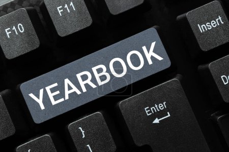 Photo for Writing displaying text Yearbook, Internet Concept publication compiled by graduating class as a record of the years activities - Royalty Free Image