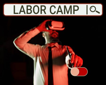 Photo for Hand writing sign Labor Camp, Business concept a penal colony where forced labor is performed - Royalty Free Image