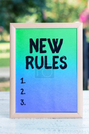 Foto de Text showing inspiration New Rules, Word for A state of changing an iplemented policy for better upgrade - Imagen libre de derechos