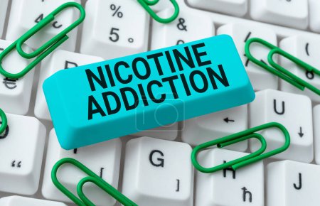 Téléchargez les photos : Conceptual caption Nicotine Addiction, Word Written on condition of being addicted to smoking or tobacco consuming - en image libre de droit