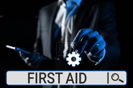 Photo for Text sign showing First Aid, Business concept Practise of healing small cuts that no need for medical training - Royalty Free Image