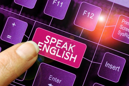 Foto de Text sign showing Speak English, Word Written on Study another Foreign Language Online Verbal Courses - Imagen libre de derechos