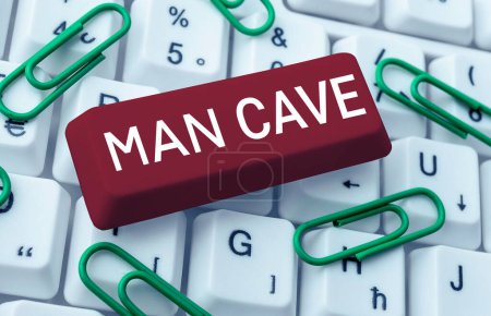 Foto de Señal que muestra la cueva del hombre, palabra para una habitación, espacio o área de una vivienda reservada para una persona masculina - Imagen libre de derechos