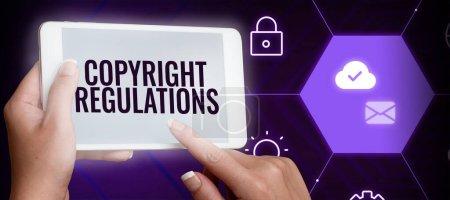 Foto de Text sign showing Copyright Regulations, Business overview body of law that governs the original works of authorship - Imagen libre de derechos