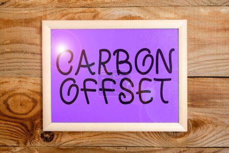 Photo for Sign displaying Carbon Offset, Conceptual photo Reduction in emissions of carbon dioxide or other gases - Royalty Free Image