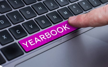 Photo for Text sign showing Yearbook, Word Written on publication compiled by graduating class as a record of the years activities - Royalty Free Image
