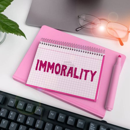 Photo for Hand writing sign Immorality, Concept meaning the state or quality of being immoral, wickedness - Royalty Free Image