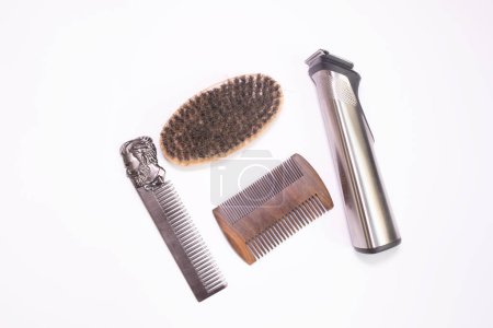 Photo for Different combs, brushes and other tools for grooming a beard. Close up view. - Royalty Free Image