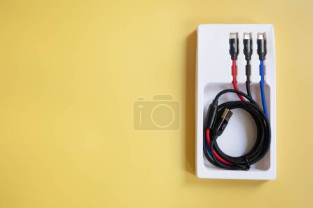 Photo for Electric cables on yellow background - Royalty Free Image