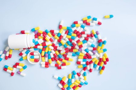 Photo for Many colorful pills and capsules on light background. - Royalty Free Image