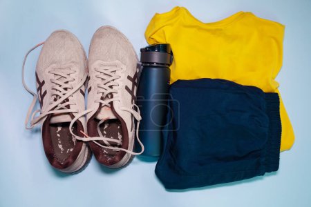 Photo for Workout equipment for training at home top view. Fitness, workout items, healthy lifestyle concept. - Royalty Free Image