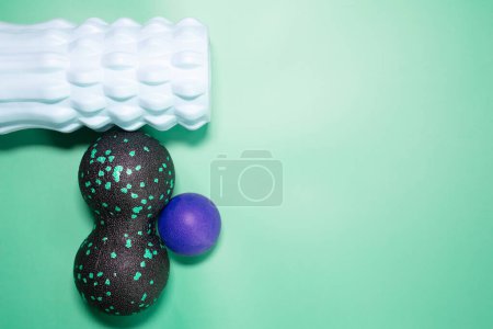 Photo for Top view of workout equipment for training on green background. Fitness, workout items, healthy lifestyle concept. - Royalty Free Image