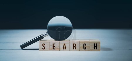 Searching Browsing Internet Data Information. Search Engine Optimization SEO Networking Concept. Search word on wood block with magnifying glass. Global information network surfing website.-stock-photo