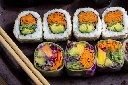 Photo for Nice plate of vegetable sushi, rich and tasty sushi assortment perfect for eating - Royalty Free Image