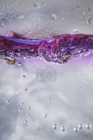 Photo for Ice with lilac colored tonic - Royalty Free Image