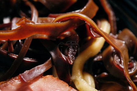 Photo for Closeup of Korean black mushroom salad with fresh vegetables served for lunch at restaurant - Royalty Free Image