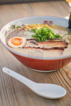 Photo for Stock photo of yummy ramen soup with boiled egg and meat in japanese restaurant. - Royalty Free Image