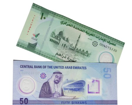 Téléchargez les photos : Émirats arabes unis nouveaux billets de banque de 50 et 10 dirham polymère isolés sur fond blanc - en image libre de droit