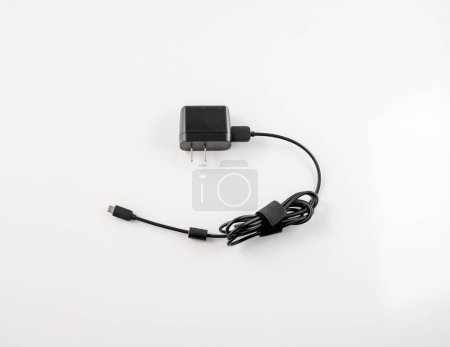 Foto de Charger for electrical devices isolated on white background - Imagen libre de derechos