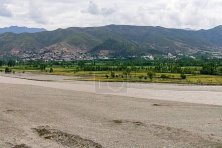 Photo for Wide angle view a river after flood in the valley - Royalty Free Image