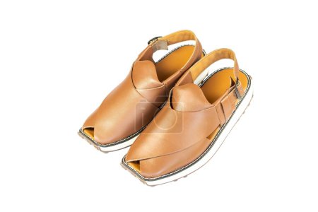 Photo for The Peshwari chappal or tsaplay are worn by men casually or formally, usually with the shalwar kameez in summer use as a sandals or slippers in Pakistan. - Royalty Free Image