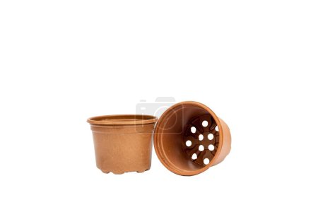 Photo for Brown plastic flowerpot plant pot on white background - Royalty Free Image