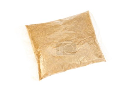 Foto de Abono en polvo de pastel de Neem en paquete pequeño aislado sobre fondo blanco - Imagen libre de derechos
