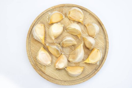 Photo for Fresh garlic cloves isolated on a white background - Royalty Free Image