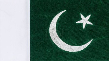 Pakistan flag consists of dark green with a white vertical stripe, a white crescent and a five pronged star in the middle