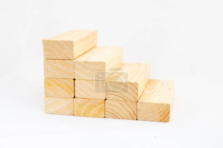 Wooden block stairs isolated on white background. Space for text or concept.