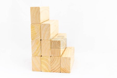 Blank wooden bars stacked in ascending or descending order on white isolated background