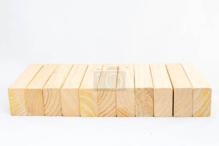 Photo for Closeup of a wooden blank blocks row on white isolated background - Royalty Free Image