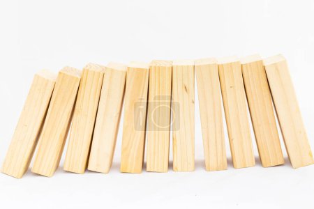 Photo for Wooden blocks standing supporting each other on white background. Leadership and support concept. space for text. - Royalty Free Image
