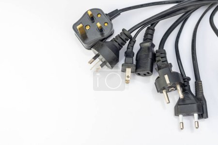 Several wires with different plugs on isolated white background