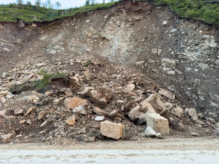 Large Rocks Block Road Due to Mountain Landslide