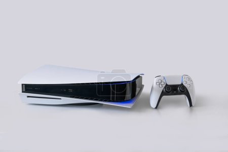 Foto de Playstation 5 and Dual Sense controller isolated, 1 Mar, 2023, Sao Paulo, Brazil. - Imagen libre de derechos
