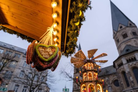 Photo for 1Bonn, Germany - December 16, 2023 : View of a decorated outdoor bar and people walking around the  Christmas Market in Bonn Germany - Royalty Free Image