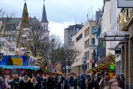 Photo for Bonn, Germany - December 23, 2023 : People walking around the traditional  and picturesque Christmas Market in Bonn Germany - Royalty Free Image