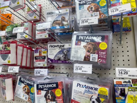 Foto de Lynnwood, WA USA - circa August 2022: Wide angle view of pet flea and tick treatments for sale inside a Target retail store. - Imagen libre de derechos
