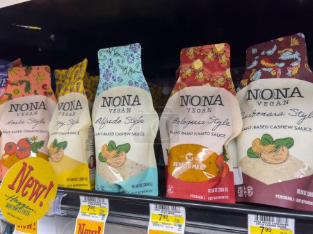 Photo for Seattle, WA USA - circa September 2022: Close up view of Nona brand vegan pasta sauces for sale inside a grocery store. - Royalty Free Image