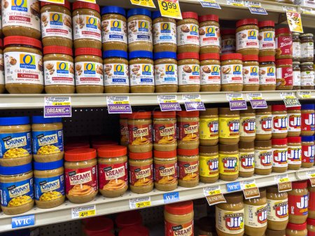 Photo for Snohomish, WA USA - circa November 2022: Wide view of a selection of peanut butter for sale inside a grocery store. - Royalty Free Image