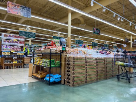 Photo for Snohomish, WA USA - circa November 2022: Wide view of people shopping in the produce section of a Haggen grocery store. - Royalty Free Image