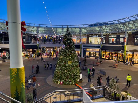 Photo for Redmond, WA USA - circa December 2022: Wide view of a large Christmas tree display in the downtown Redmond shopping district. - Royalty Free Image