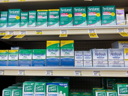 Photo for Everett, WA USA - circa December 2022: Close up view of eye drops and disinfecting contact solution for sale inside an Albertsons grocery store. - Royalty Free Image