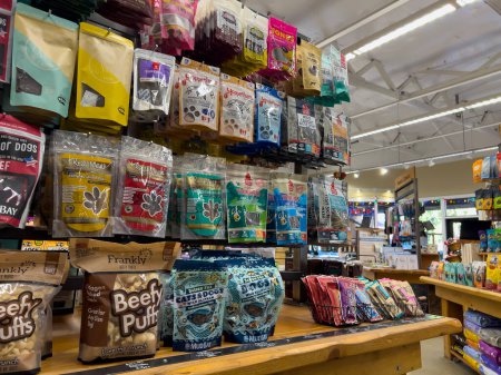 Photo for Mill Creek, WA USA - circa December 2022: Angled view of dog treats for sale inside a Mud Bay pet store. - Royalty Free Image