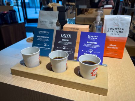 Photo for Lynnwood, WA USA - circa January 2023: Close up view of a coffee tasting flight inside a Seattle Coffee Gear shop. - Royalty Free Image