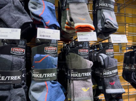 Photo for Lynnwood, WA USA - circa January 2023: Close up view of thick hiking socks for sale inside an REI store at the Alderwood Mall. - Royalty Free Image
